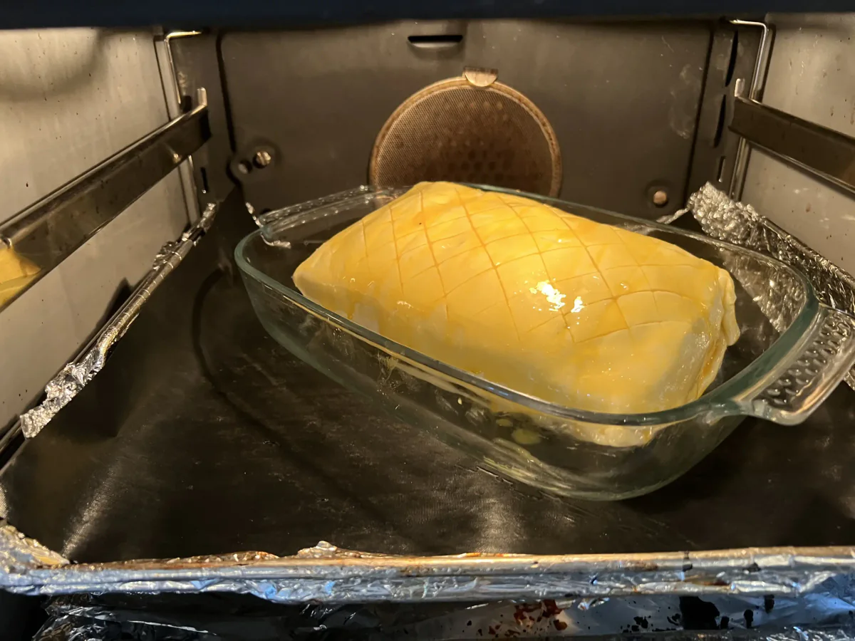 Meat wrapped in puff pastry in an ovenproof dish.