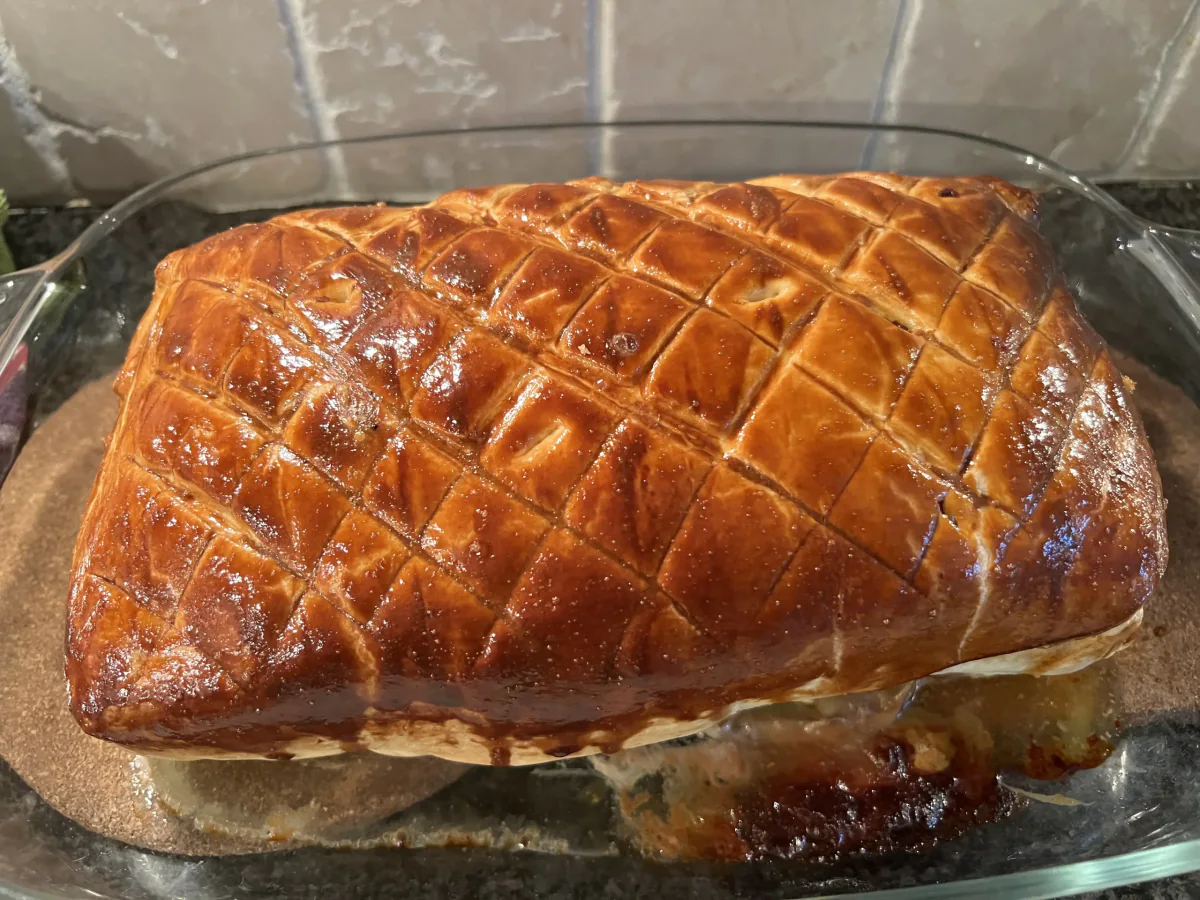Golden-brown puff pastry with a diamond pattern.