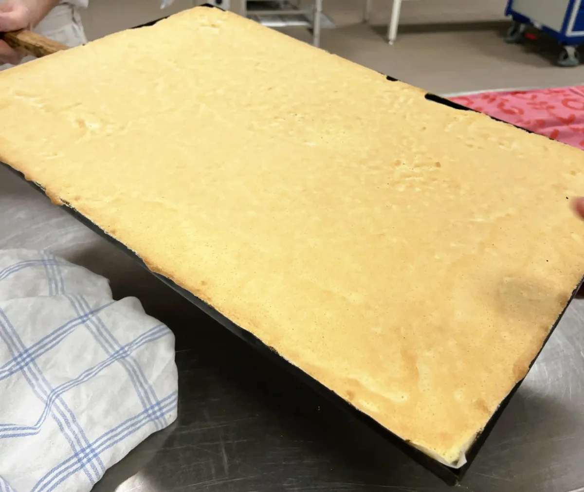 A thinly rolled sheet of pastry on a baking tray.