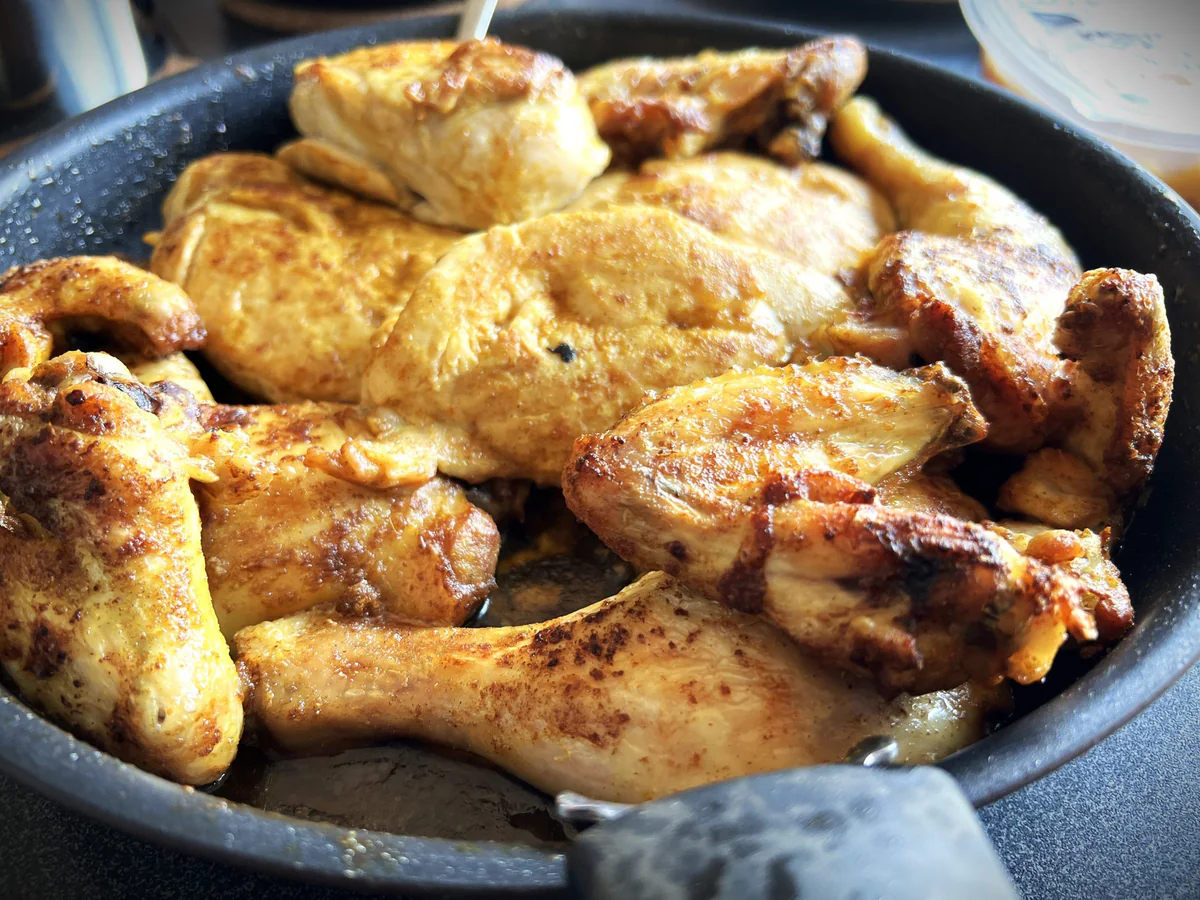 Butter-browned chicken pieces roasted in the oven