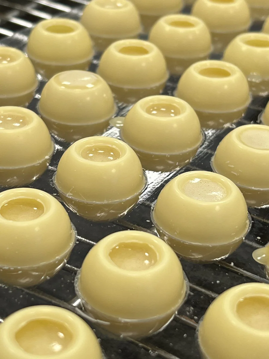 White chocolate spheres with advocaat filling.
